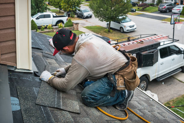 Professional Roof Replacement technician working in Milton Village, MA
